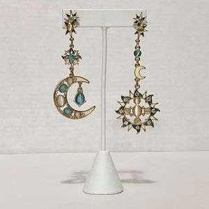 Pair of sun and moon earrings